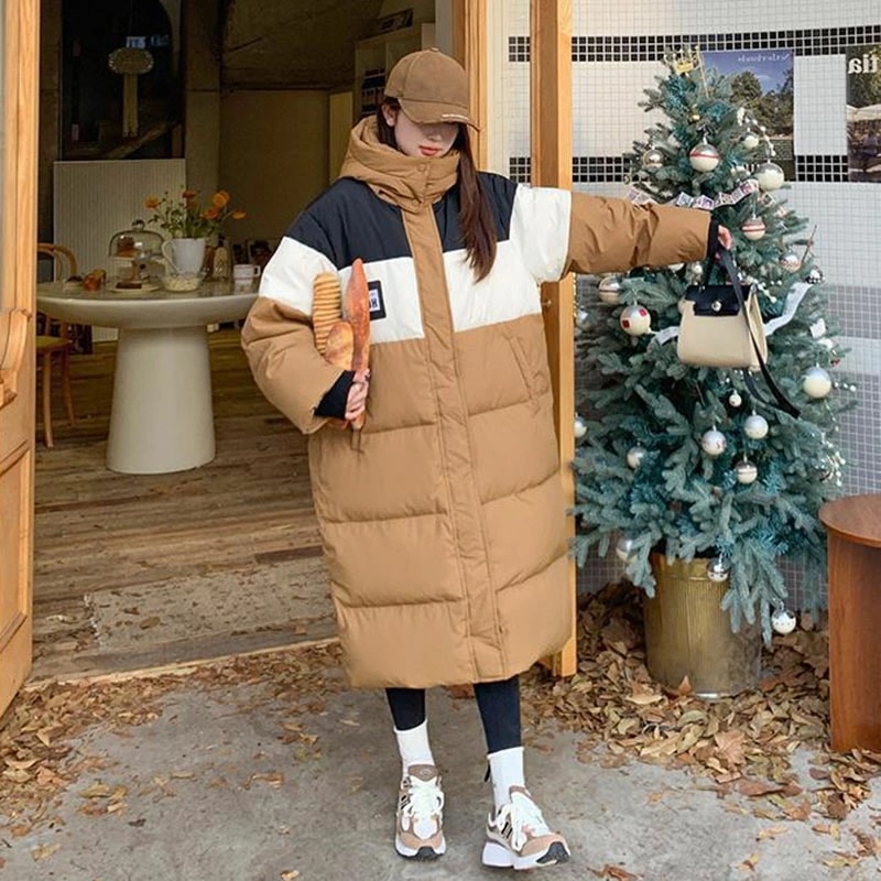 ダウンジャケット ロング ダウンウェア ウィンターウェア 防寒アイテム ウィンターファッション ダウンコートスタイル 寒さ対策 上質な素材 ファッションスタイル 暖かさ重視 寒さからの保護 ダウンの魅