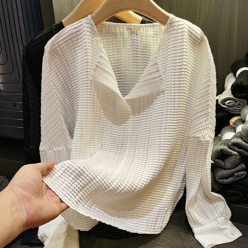 フランスの軽熟風トウモロコシの粒のしわの上着の秋の気質はゆったりしていて痩せている長袖のシャツ