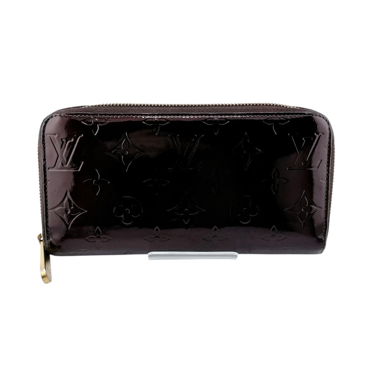 M93575 ジッピーウォレット モノグラム ラウンドファスナー マゼンタ 14,652円