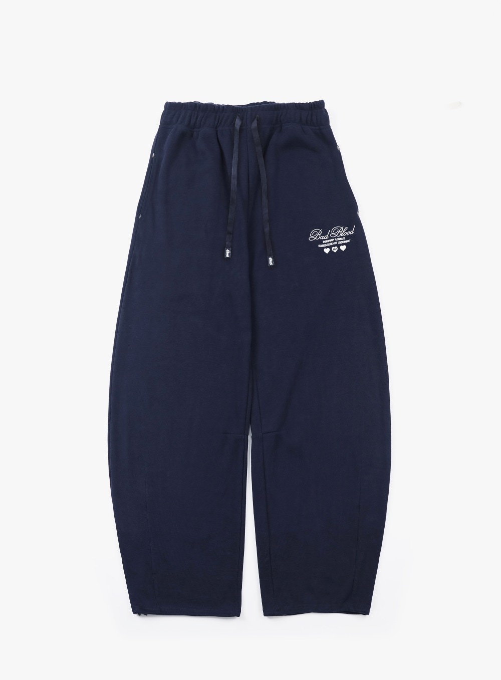 【BADBLOOD】[UNISEX] CLASSIC LOGO 2WAY CURVED JOGGER TROUSERS : NAVY