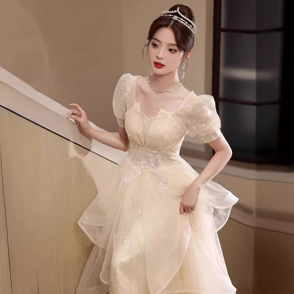 イブニングドレス宴会気質成人式軽贅沢シャンパン色ロングフレンチ司会者学生芸考ドレス