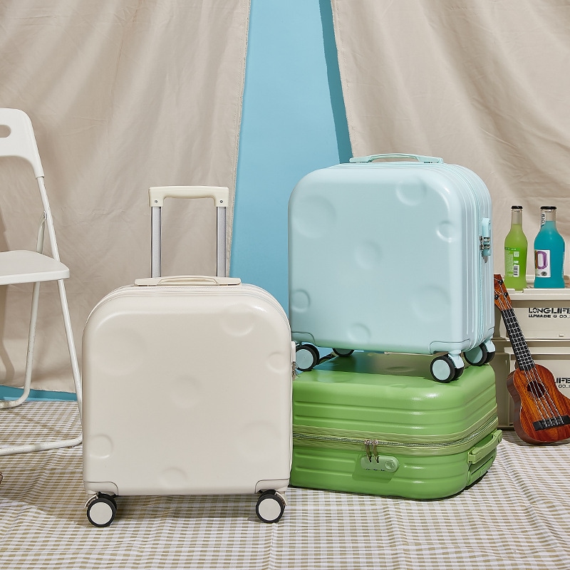 スーツケースの女性の軽いスーツケースはケースの万能輪の旅行箱のパスワードの箱に登ります