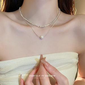クラッシュシルバーパールネックレス女性の2023新しい光豪華なニッチ高レベルの感覚を身に着けている鎖骨のチェーンネックレスを積み重ねるアクセサリー