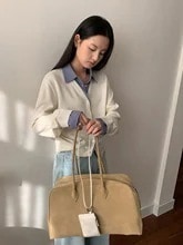 年の早春 女性向けのインテリアント風のフェイクツーピースチェックシャツ ニットのポロオープレギュラーカフスンカーデパステルカラーィガンとのパッチワークデザインです