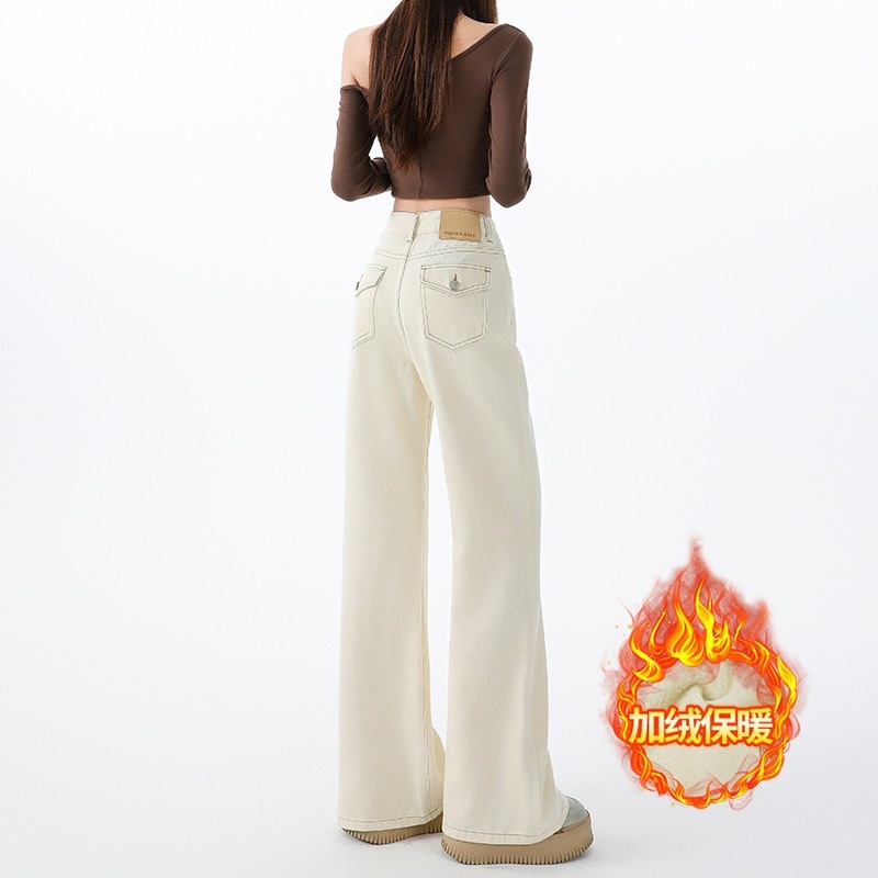秋冬にぴったりのレディース用ベージュのフリース裏地付きハイウエストゆったりフレアジーンズスリムフィットで体にぴったりフィットしない床までの長さのプラットフォームパンツです