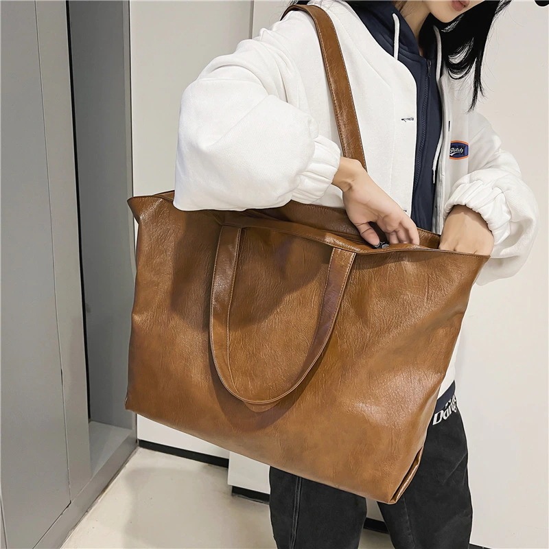 韓国ファッション 新商品 男女兼用 ソフト PU 手提げバッグ 大容量トートバッグ 旅行バッグ レディース 通 勤 ハンドバッグ