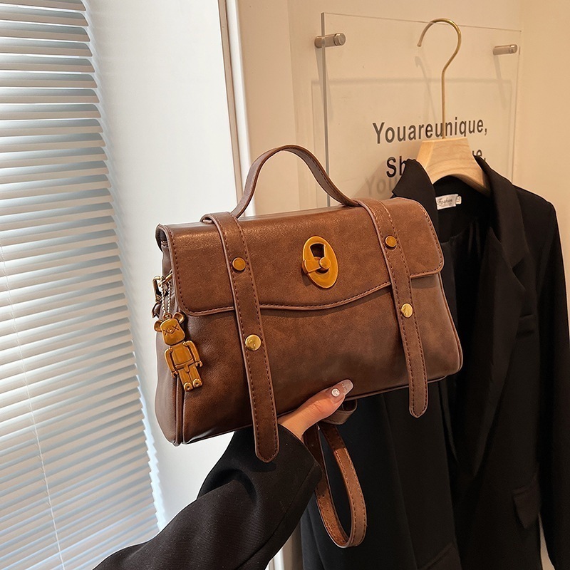 ショルダーバッグ トートバッグ 韓国ファッション レトロメッセンジャーバッグ 2025新しいレディースポータブルソフトレザーバッグソリッドカラーハイエンドニッチデザインショルダークロスボディバッグ