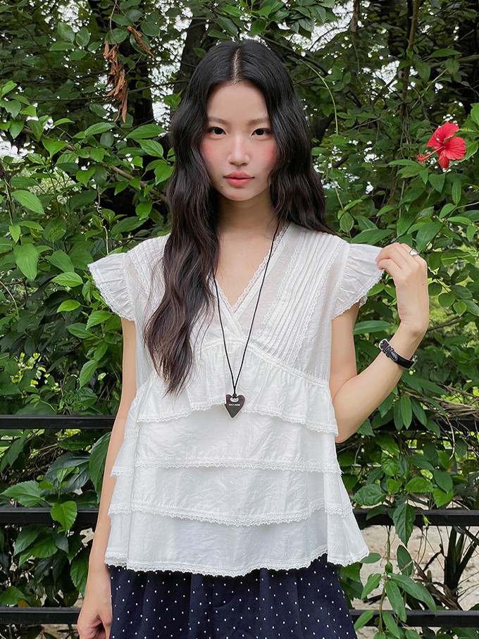 ホワイト袖なし ブイネック レース フリルブラウス
