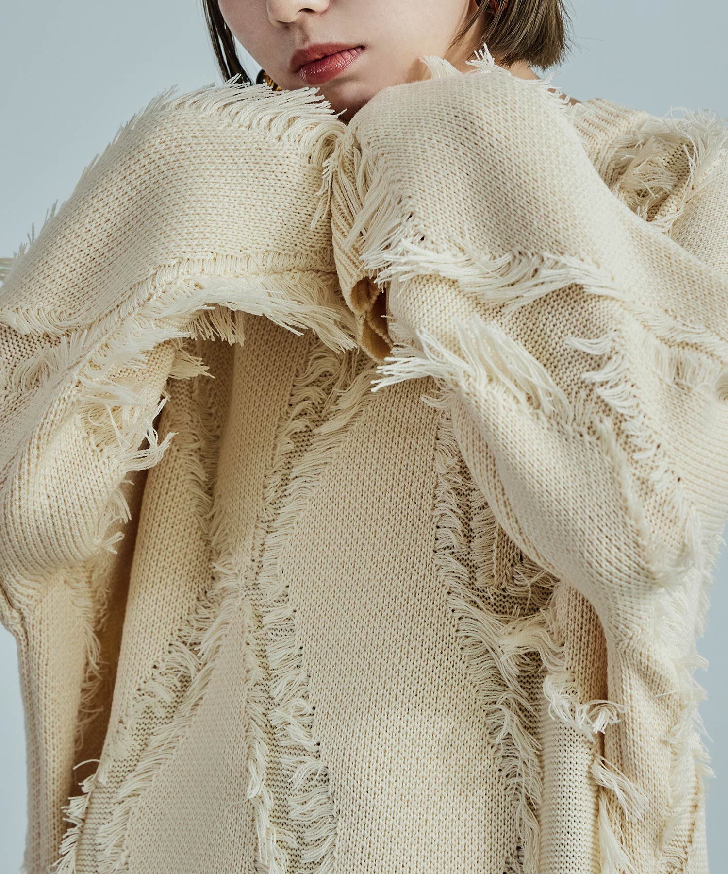 ジグザグフリンジ オーバーサイズニット トップス 長袖 フリンジニット ゆったり ビッグシルエット セーター モノトーン 大きめサイズ