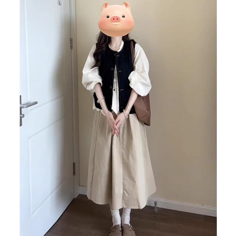 女性の新モデルのレトロな風の優しい気質を着てそろいそろいベストの半身のスカートの3件のスーツを重ねて着ます