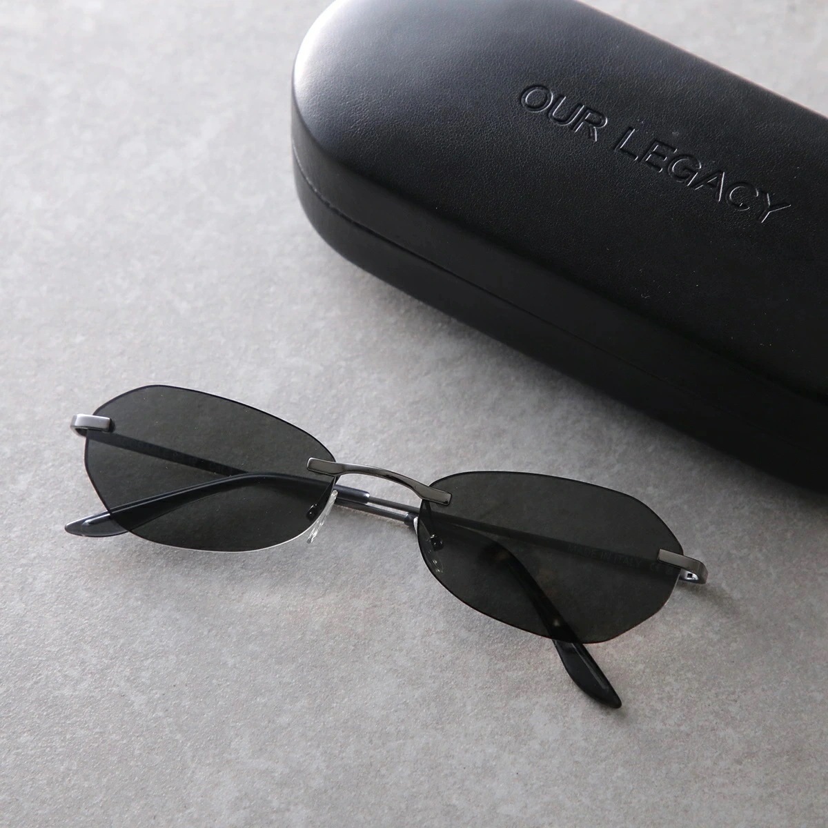 OUR LEGACY アワーレガシー サングラス ADORABLE A4238ATB ポリゴン型 リムレス クリングスタイプ ロゴ アイウェア TRINITY-BLACK 【mega】