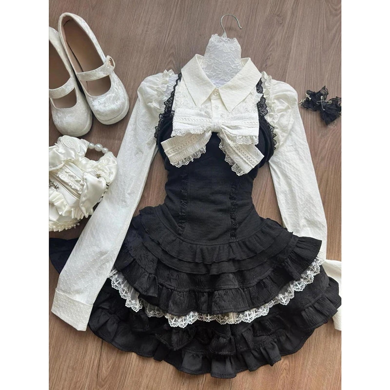 韓国風の甘い蝶ネクタイの女性の春と秋の3点セット：キャミソールトップ白いシャツハイウエストスカート