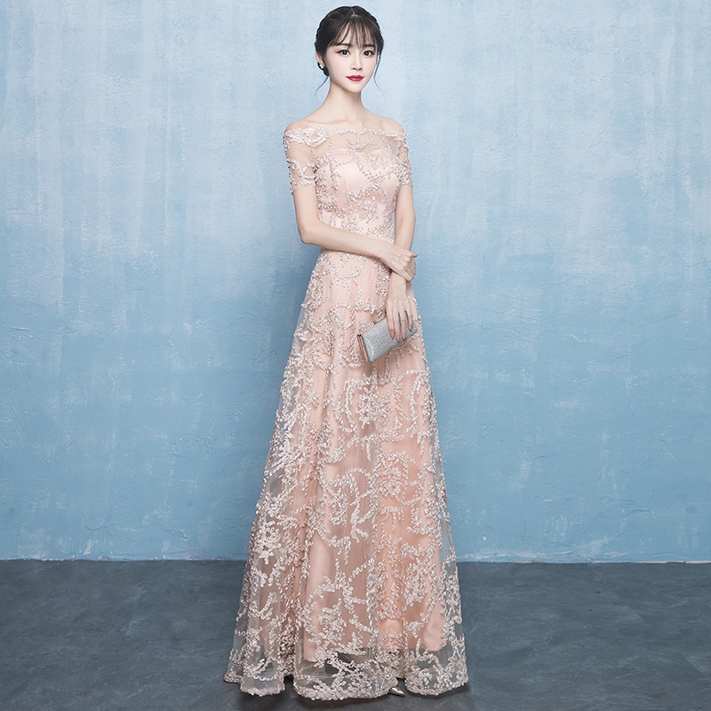 宴会シャンパーニュゴールドイブニングドレス女性2025会司会者優雅な一文字肩ドレスドレスドレスドレスドレス修身長