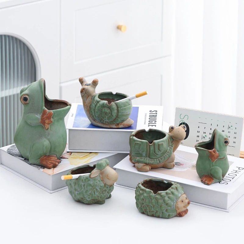 【20点セット】【送料無料】クリエイティブ灰皿家庭用リビング高級感個性的なカートゥーンストリームオフィス軽量・飛び灰防止デスクトップ置物