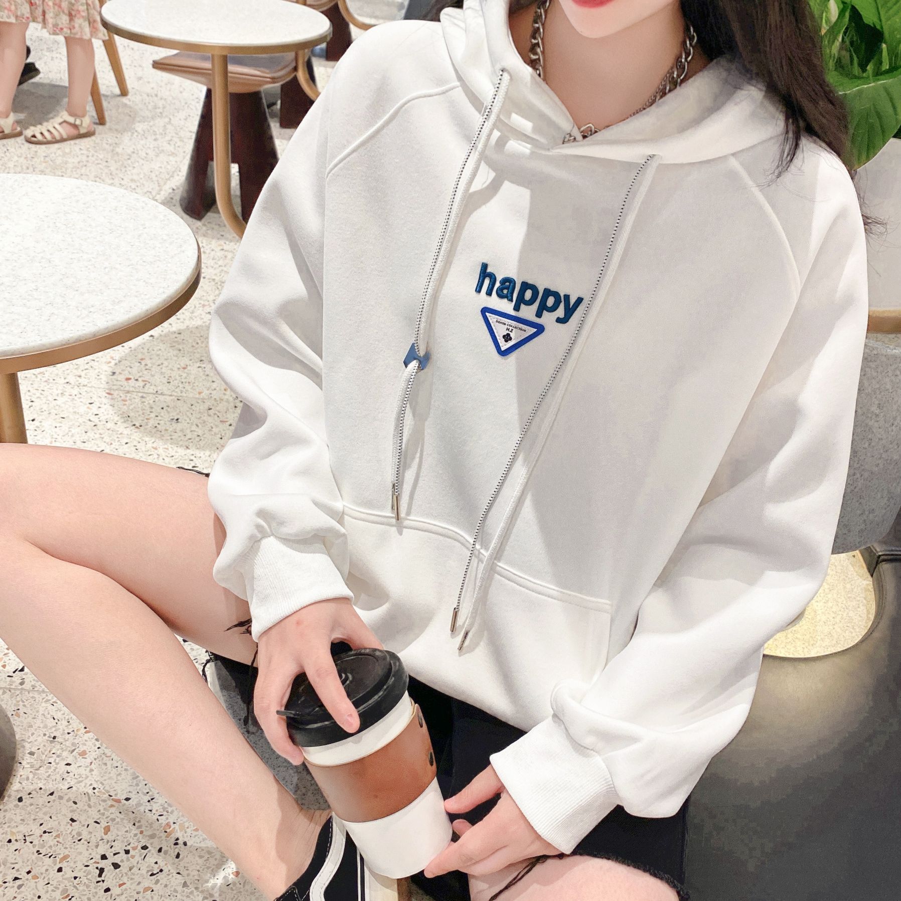 トップスTシャツカットソーパーカー 早秋のブラウスデザインセンスマイナー韓国版ゆったり肩長袖衛衣女薄金スウェット