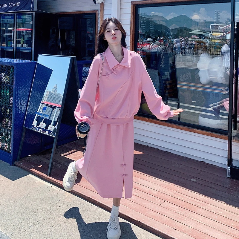 新しい中国のカジュアルなディスクボタンセーター半身スカートスーツ2024新しいミルクhoo hoo年齢削減国家スタイルのツーピーススーツ