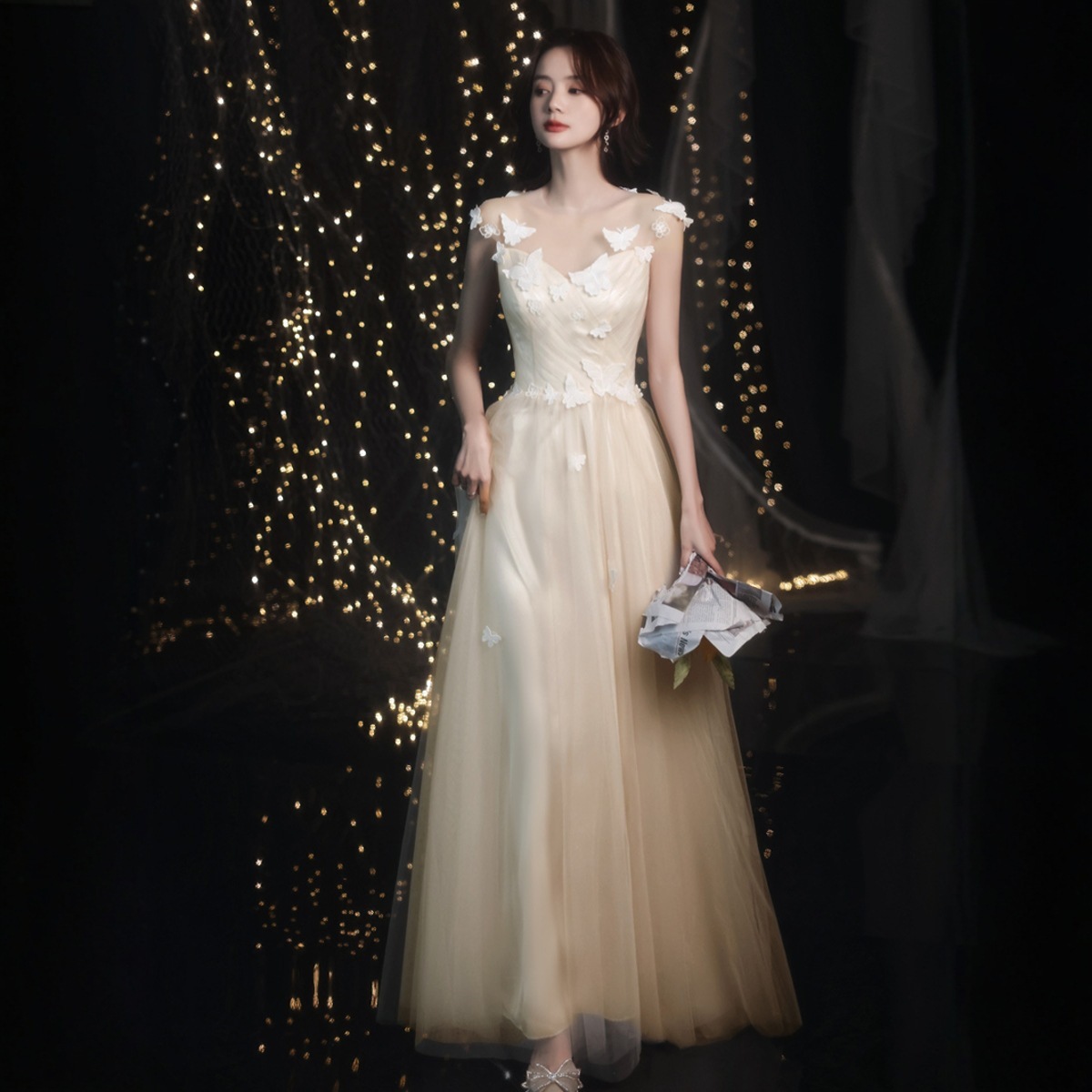 シャンパン色の婚約ドレスの花嫁服は贅沢な女性たちの誕生日パーティーに感謝します