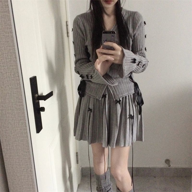 セットアップ 涼しく楽ちんセットアップ韓国ファッション 二点セットショート丈トップス＋リボン半身スカートニットスーツ女 蝶結び 修身 着痩せ 可愛らしい