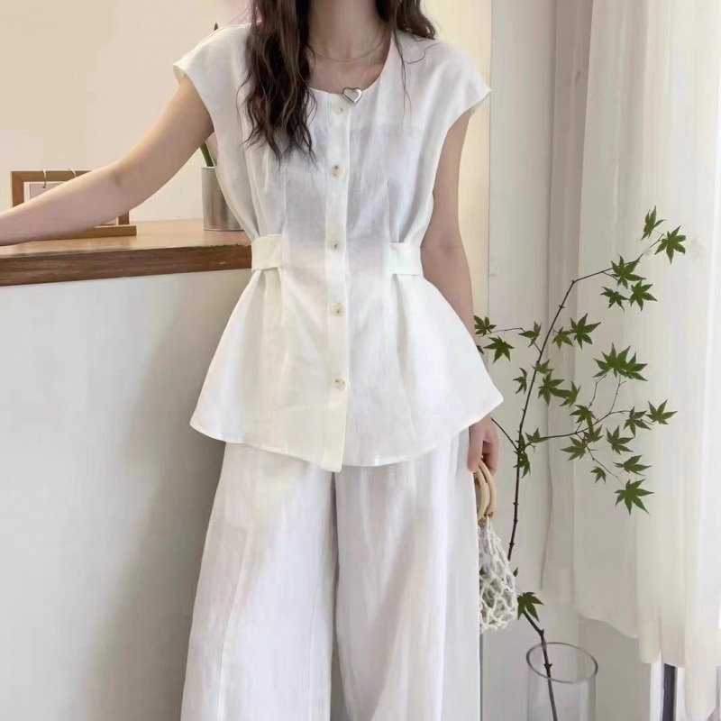 【1つ買うと10つ無料】2025夏のファッションセンスシングルブレストソリッドカラー汎用シンスタイルサイドボタンウエストハギングシャツの女性