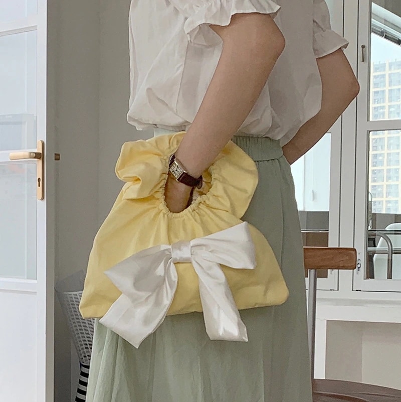 かわいい蝶ネクタイバッグミニ手首雲バッグ女性の新しいしわレースバッグ卸売り