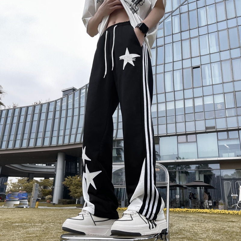 スプライシング衝突ワイドレッグモデル男性と女性スター刺繍ドローストリングストライプバードレープストレートジャズダンスカジュアルパンツ
