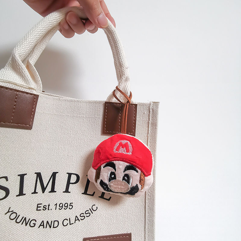 漫画マリオの名前はブランドのストラップのぬいぐるみの子供のかばんに飾られた人形のキーホルダーがかわいい誕生日プレゼント男