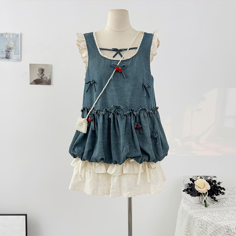 【1点ご購入 で10点プレゼントいたします】甘い木の耳元に蝶結びのつぼみをつなぎ合わせたキャミソール女性の夏のしわの層になったケーキのスカート2枚セット