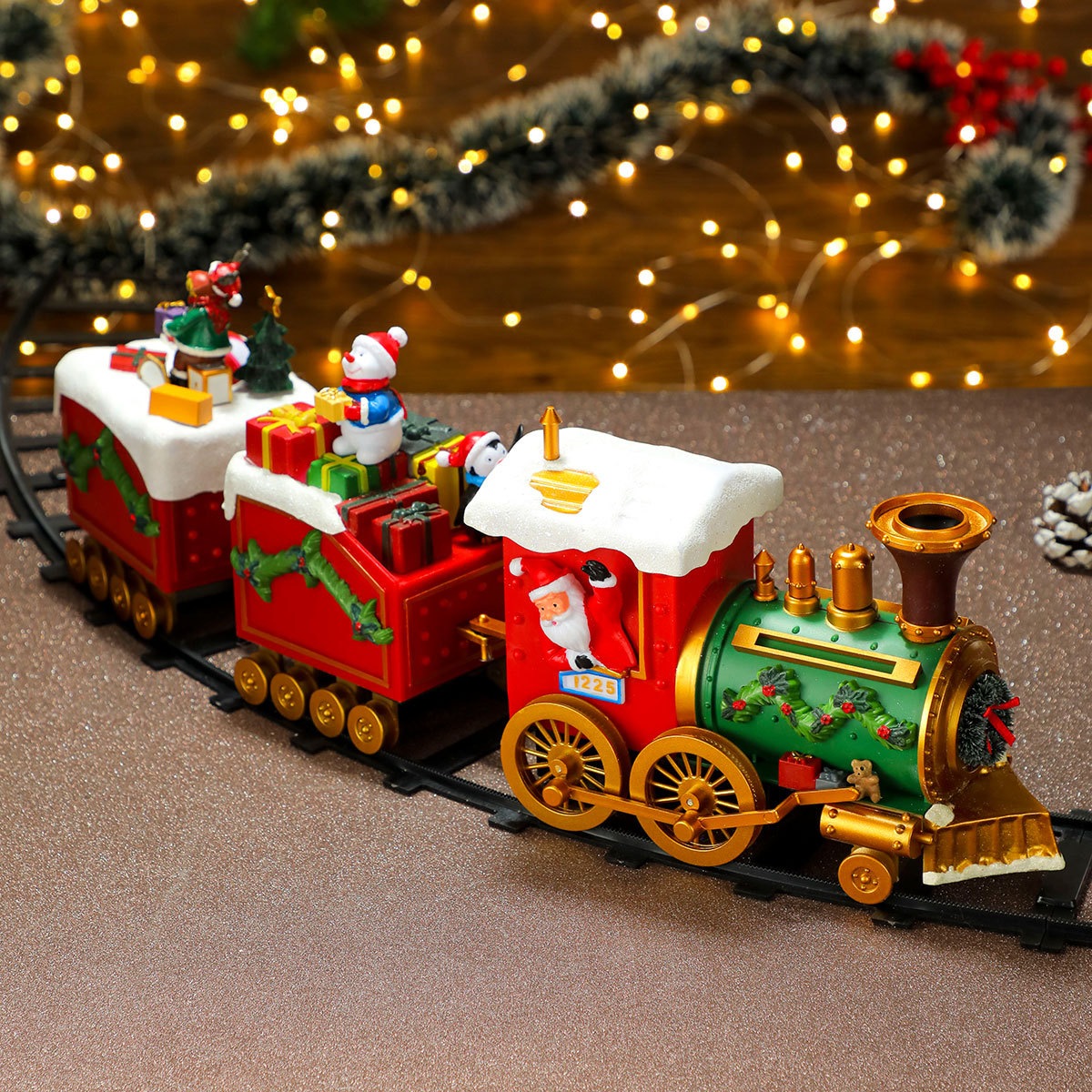 直径 1.35 メートルのクリスマスツリーの雰囲気シーンのレイアウトの周りのクリスマスレールトレイン装飾