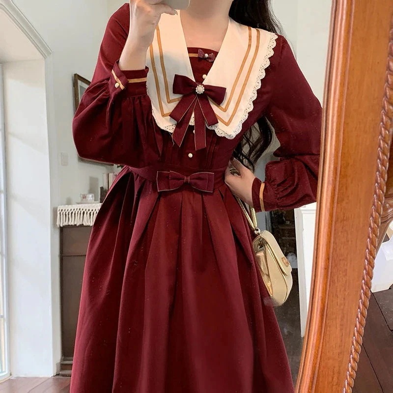 かわいい弓の王女のドレス秋フランスの超妖精パールレースネイビーカラーウエストドレス女性の中間の長さ