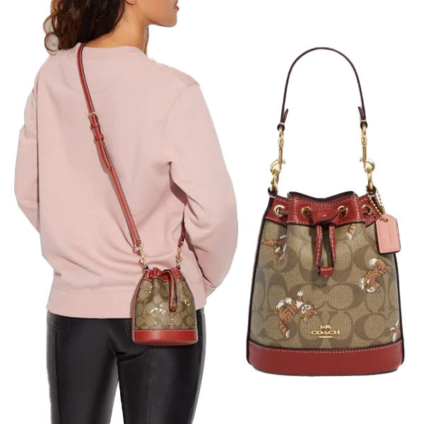 CC431 Mini Dempsey Bucket Bag In Signature Canvas With Dancing Kitten Print 17,991円