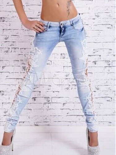 ブルーローライズは女の子のためのジーンズをリッピング