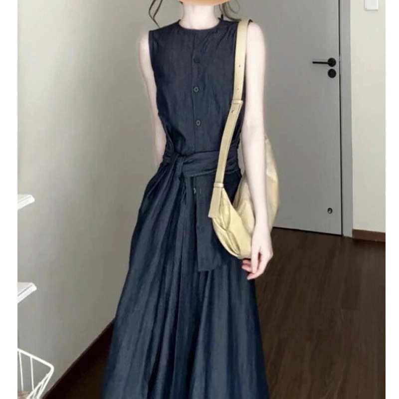 昔ながらの丸首ノースリーブタイアップトップスとゆったりAラインスカートのセット女性の新しい夏のスタイル高級感