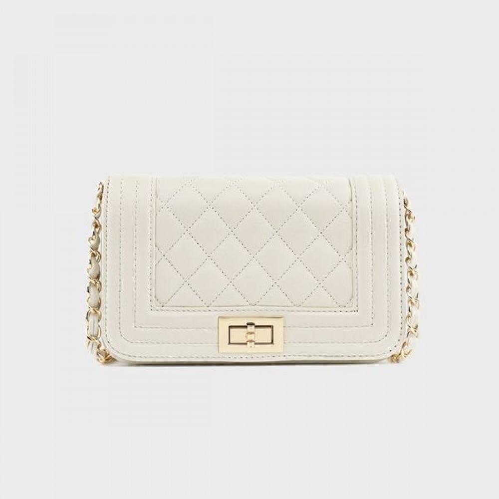 [モナサック] モナックアデレーヌ牛革スクエアキルトクロスボディバッグアイボリーAL18-2803-IV