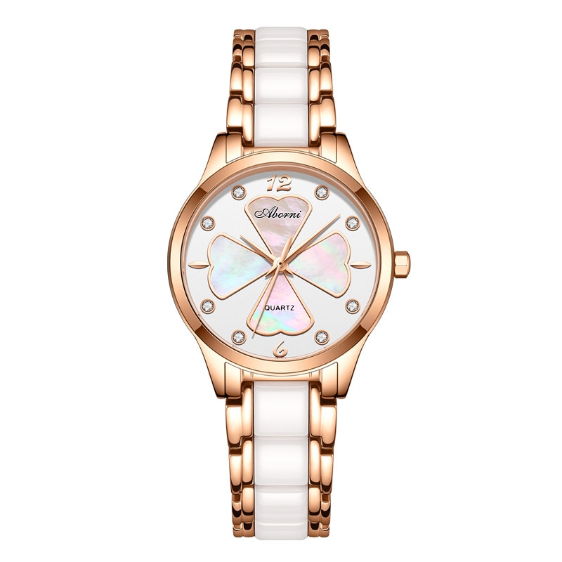 新商品の亜プラチナ腕時計の女性幸運四葉草にダイヤモンドの陶磁器の石英の女性時計の薄い女性の小さい文字板の腕時計を入れます